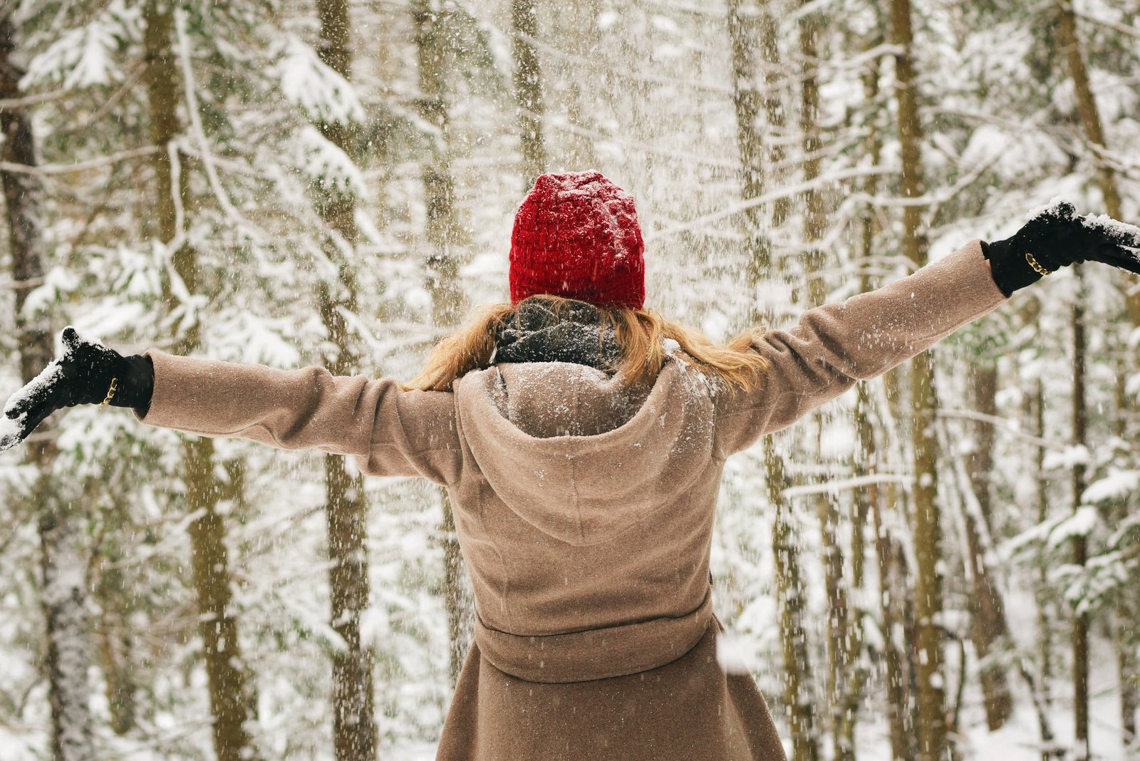 Woman excited about taking a walk in the snow